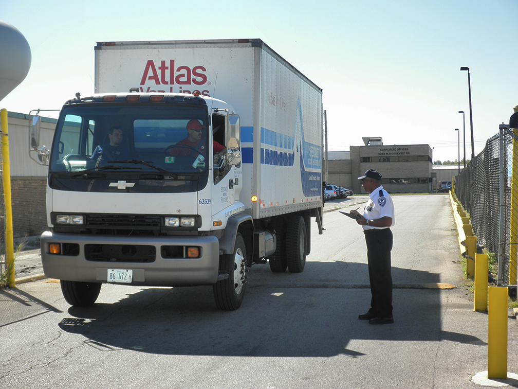 american security guard checking in with trucking transportation